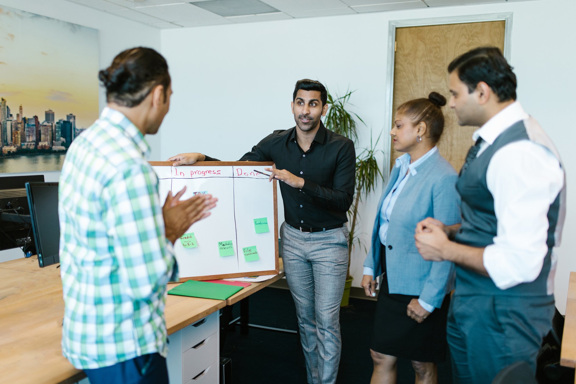 People in a Meeting while Standing